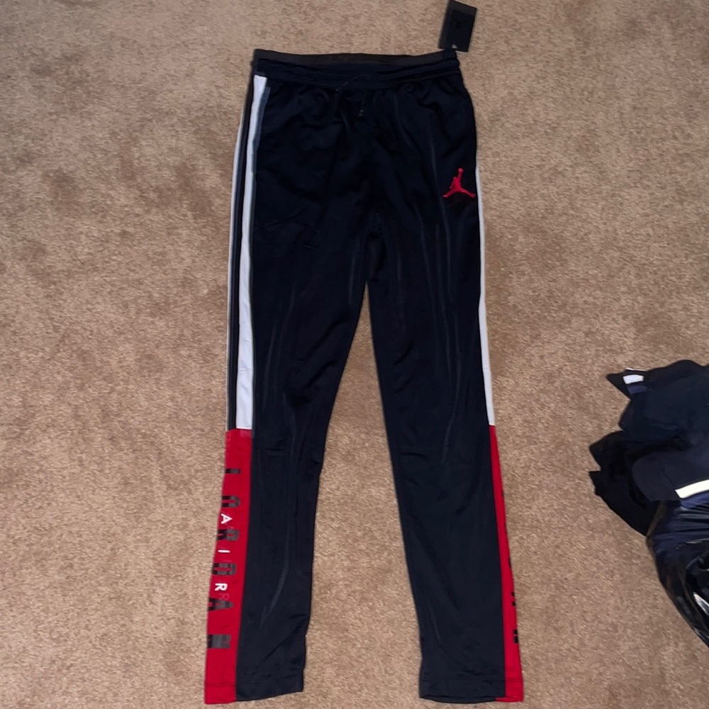 Jordan boys sweatpants black red and white. Size XL